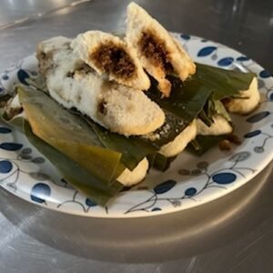 Haladi patra Pitha